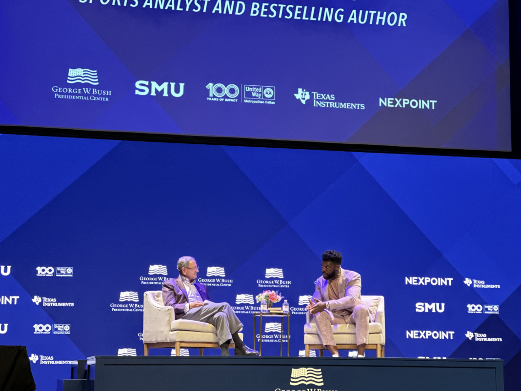 Emmanuel Acho, former NFL linebacker and bestselling author, speaks with George W. Bush Institute President and CEO Ken Hersh during the Community Conversation event held in McFarlin Auditorium. 